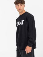 Sudadera negra Squat 100% algodón en outfit deportivo.