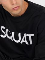 Sudadera negra con logo SQUAT en detalle frontal, algodón orgánico.